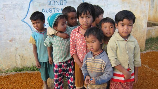 Australian aid money built a water tank to this remote village in the opium-growing region of Shan State, Burma, in the mid-1990s. The villagers have rarely seen foreigners since then. 