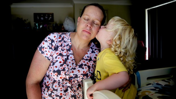 Helped through depression: Molly Hutcherson receives a kiss from son Clem, 2. She suffered mental health problems after giving birth. 