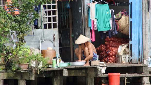 On stilts: A riverside house at Cai Be.