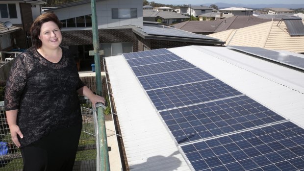 Rachael Turner of Forde with her 5.2kW solar power system that has a battery storage system.