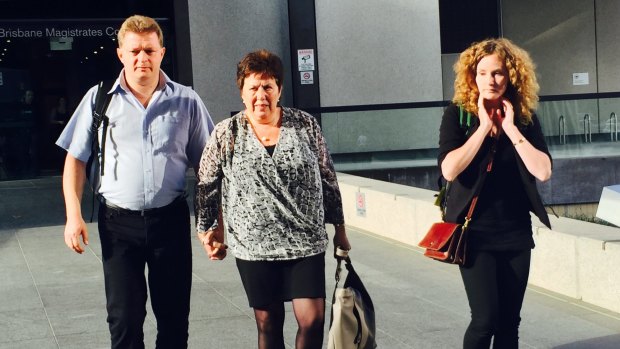 The mother and sister of Rebekka Meyers leave court on the first day of an inquest into her death at a Brisbane intersection.