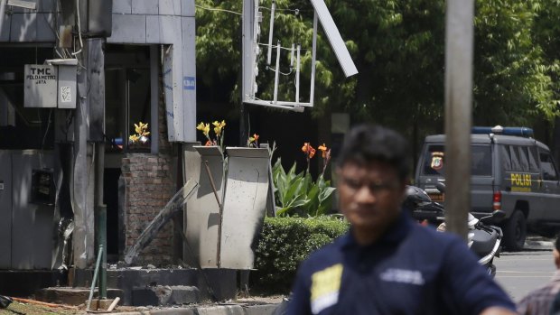 Indonesian police investigate the Jakarta blasts in January.