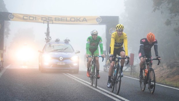 Tour de France champion Chris Froome, in yellow, at the top of the mountain stage at L'Etape.