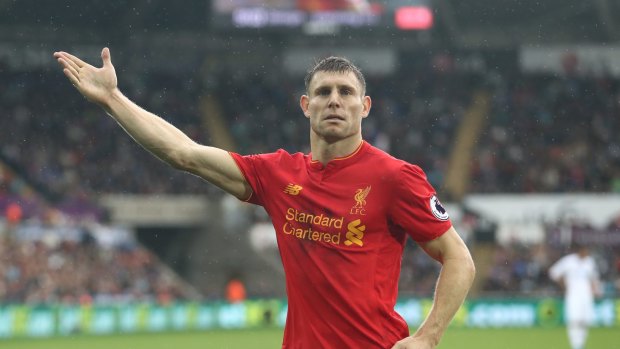 Late show: James Milner scored the winner for Liverpool at Swansea.