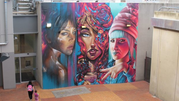A monumental mural by Adnate, Sofles and Smug at Northland shopping centre in Preston, featured in Dean Sunshine's book <i>Street Art Now</i>.