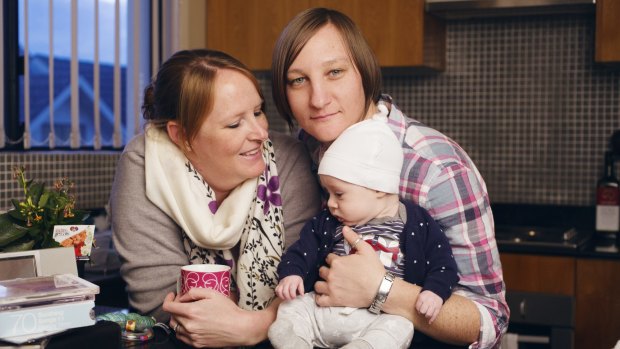 Amy Keeling (left) with her partner Amanda and their son Archer.