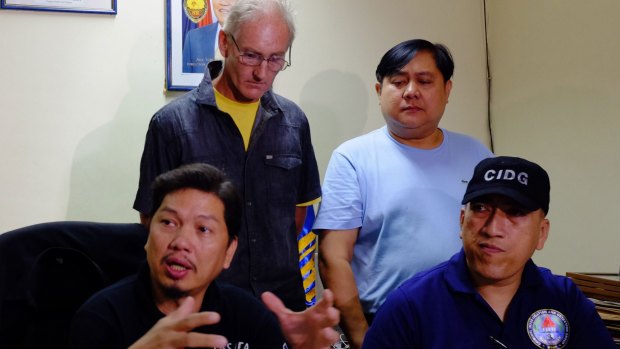 Gerard Peter Scully being presented at the National Bureau of Investigation office in Cagayan de Oro City, Philippines after his arrest.