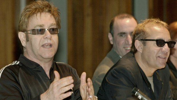 Elton John with his lifelong songwriting partner Bernie Taupin in 2003. "We're always on the same page," says John. 