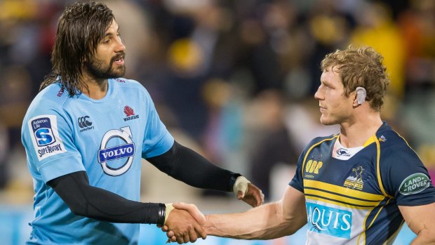 Jacques Potgieter and David Pocock shake hands after the Waratahs beat the Brumbies.