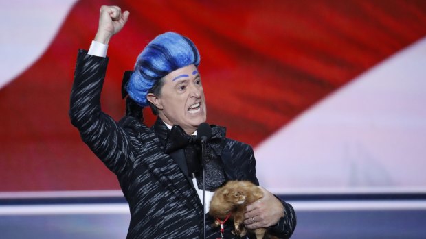 Comedian Stephen Colbert launches the '2016 Republican National Hungry for Power Games' on the stage at the Republican National Convention before being kicked off by security.