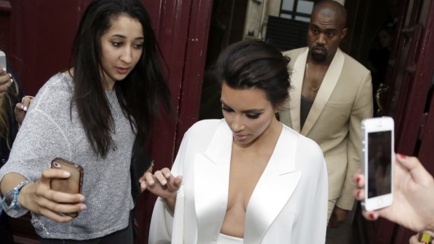 Separate worlds: Kim Kardashian has been labelled "famous for being famous".