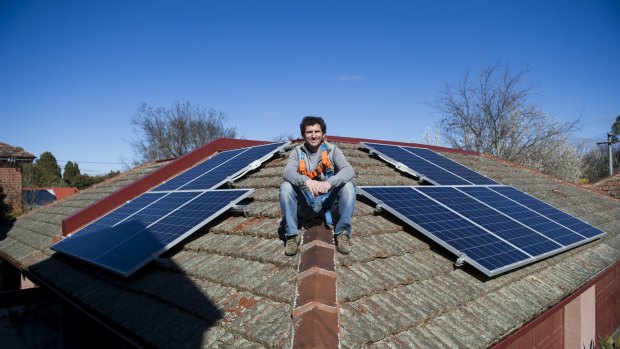 Solar panels on an Ainslie rooftop: The ACT government has moved to close off new sign-ups the premium scheme.