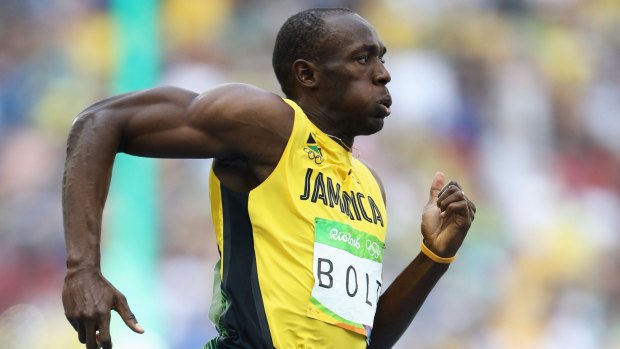 Cruising: Usain Bolt can't win as many medals as Michael Phelps, but is the greatest in his sport.