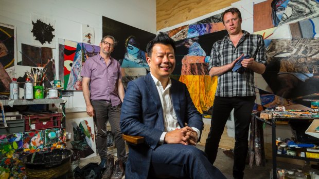 Terry Wu with artists Leslie Eastman and Steven Rendall in the Brunswick East building he has converted into studios.