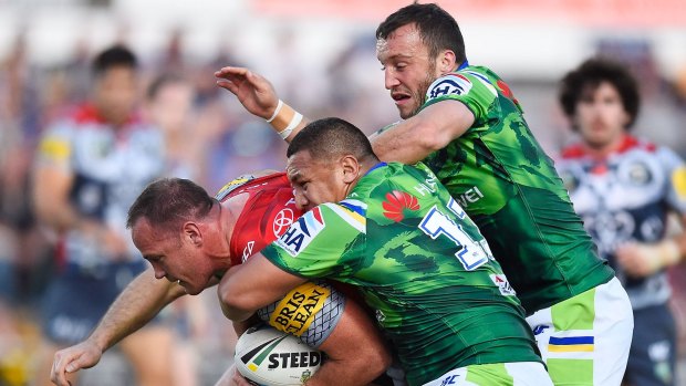 Nervous wait: Josh Hodgson, right, injured his ankle in the clash with the Cowboys. 