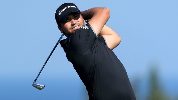 Jason Day hits his tee shot at the fourth hole in Hawaii.