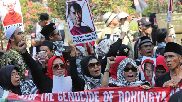 Muslim protesters shout slogans at a rally against the persecution of Rohingya Muslims outside the Myanmar embassy in Jakarta.