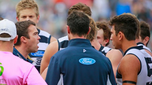 Cats coach Chris Scott tries to spur on his players at three-quarter-time.