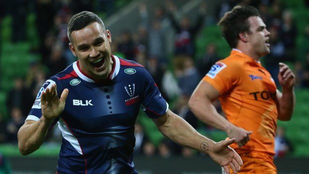 Tamati Ellison celebrates after ensuring a bonus point for the Rebels in the last minute.