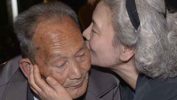 South Korean Lee Jeong-suk, 68, right, kisses her North Korean father Ri Hung Jong, 88, at the family reunions in North Korea on Tuesday. 
