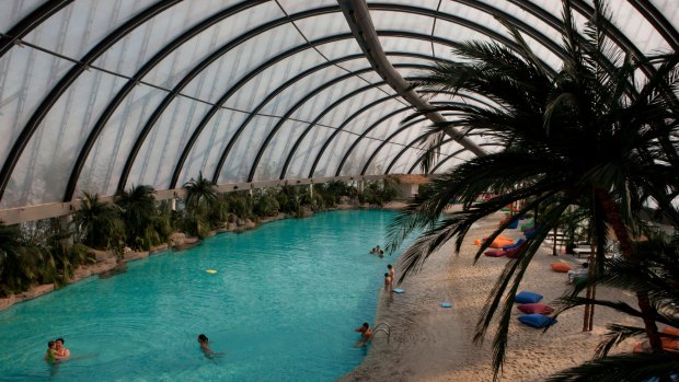 The fake beach is just one of Astana's many feats of architectural wonder. It's housed on the top floor of a shopping mall shaped like a giant tepee.