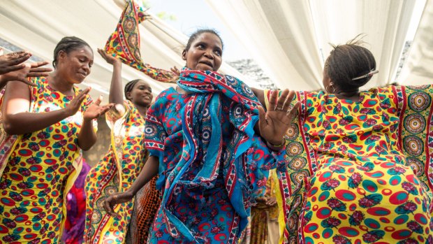 Women dance during a celebration in Lamu.