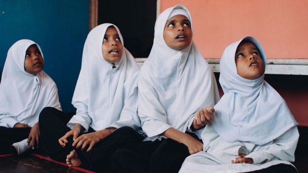 Rohingya girls join a basic mathematics class in a school run by an NGO in Penang, Malaysia.  