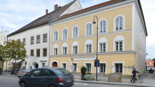 Adolf Hitler's birth house in Braunau am Inn, Austria, on the right. 