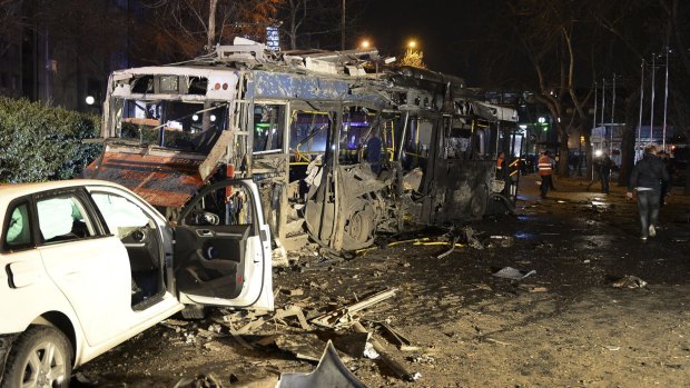 Damaged vehicles are seen at the scene of an explosion in Ankara, Turkey.