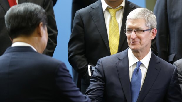 Among those who greeted Xi were Timothy Cook, the chief of Apple.