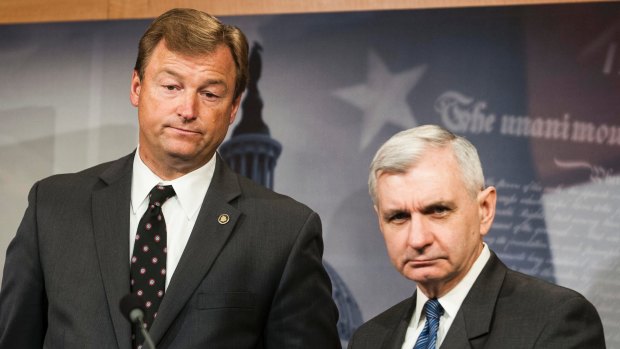Under pressure: Nevada senator Dean Heller, left, says he cannot support the Republicans' Senate bill in its current form.