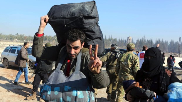 Syrians evacuated from Aleppo during the ceasefire arrive at a refugee camp in Rashidin, near Idlib, Syria on Monday.