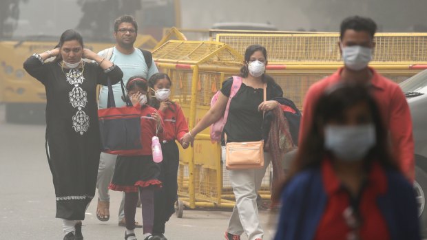 The Delhi government has ordered that all city schools be shut, construction activity halted and all roads be doused with water as crippling air pollution has engulfed the Indian capital.