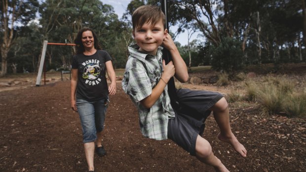 Roslyn Pengilly with her son Timothy, 7. Timothy has sensory processing issues and possibly autism spectrum disorder, and his mother Roslyn is worried that he will be forced to attend Melba Copland after year 6.