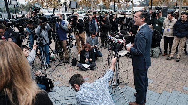 Los Angeles mayor Eric Garcetti talks to the media before taking the subway to work. 