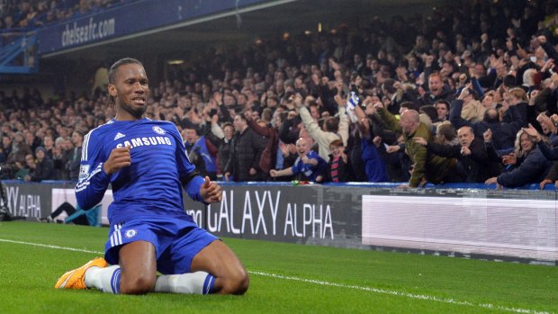 Chelsea's Ivorian striker Didier Drogba celebrates scoring a goal. 