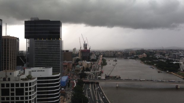 The storm rolls in over South Bank.