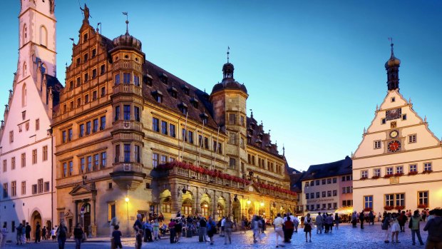 Rothenburg's town hall and main square at night.