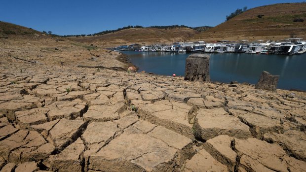 Dried mud and the remnants of a marina at the New Melones Lake reservoir.