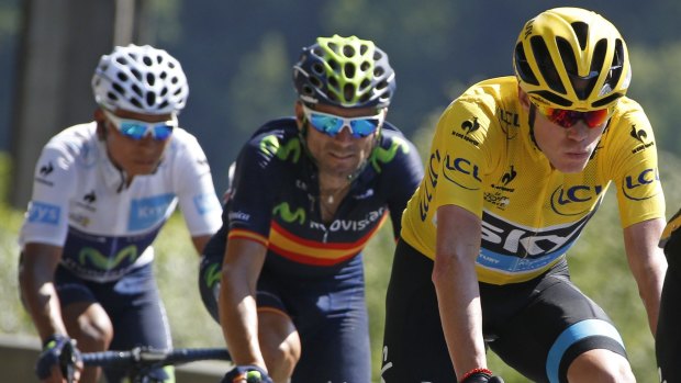 Staying out of trouble ... Team Sky rider and race leader Chris Froome of Britain (right) cycles ahead of Movistar rider Alejandro Valverde (Spain) and Nairo Quintana (Colombia). 