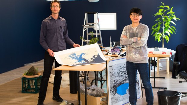 Artists Lucas Ihlein and Trevor Yeung prepare for the opening of their exhibition, <i>Sea Pearl White Cloud 海珠白雲</I>.