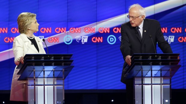 Democratic presidential candidates Senator Bernie Sanders and Hillary Clinton speak during the CNN debate in Brooklyn on Thursday.