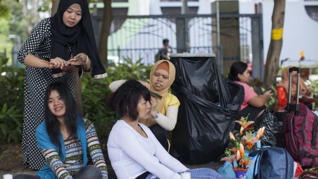 The Indonesian government hopes to improve conditions for its domestic workers abroad.