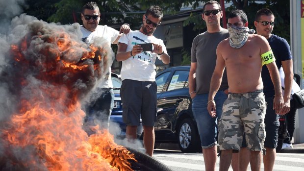 French taxi drivers protest against Uber in the southern city of Marseilles.