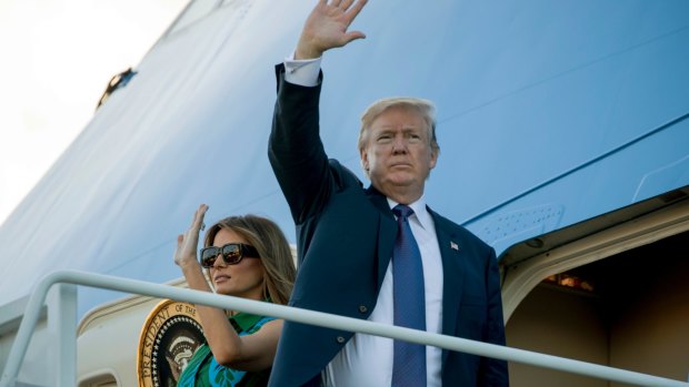 President Donald Trump and first lady Melania Trump board Air Force One at Joint Base Pearl Harbor Hickam, Hawaii.