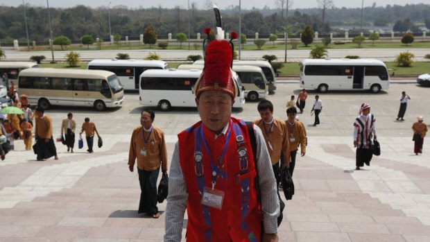 An ethnic Naga lawmaker of the National League for Democracy party arrives at parliament on Monday.
