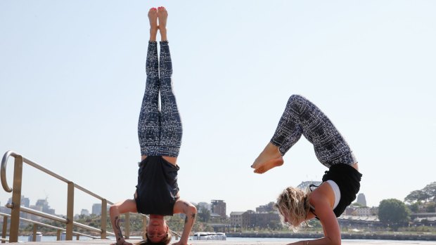 Bodypass yoga teachers, (L) Georgia van Tiel and Carla McMillan demonstrate some positions.