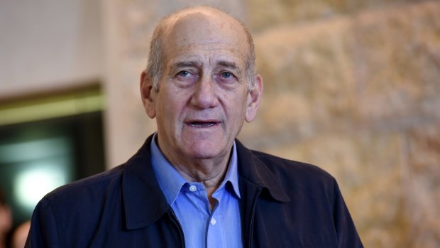 Former Israeli prime minister Ehud Olmert speaks to the media after the Supreme Court reduced his prison sentence from six years to 18 months in the Holyland corruption case.