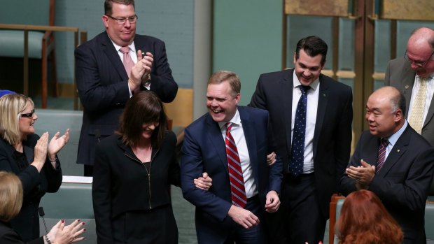 Liberal MP Tony Smith is "dragged" to the Speaker's chair in the House of Representatives at Parliament House in Canberra in August last year. 