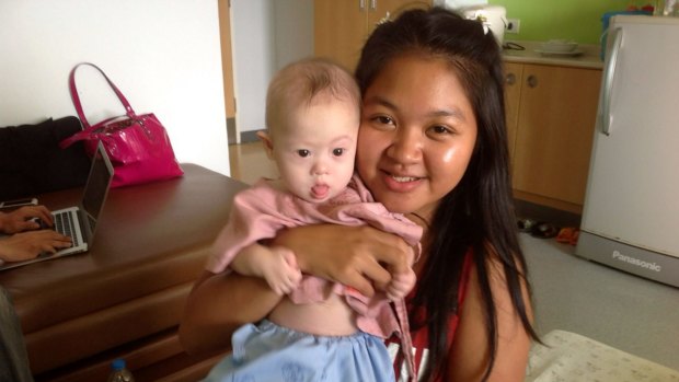 Thai surrogate mother Pattaramon Chanbua poses with baby Gammy in Bangkok, Thailand, last year. 
